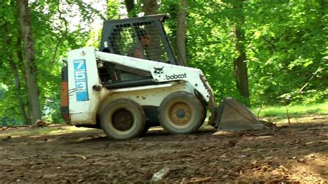 skid steer dirt leveler|leveling ground with a bobcat.